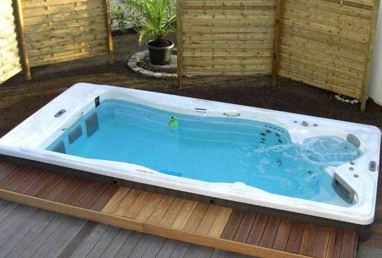 H2X Swim spa on wood patio